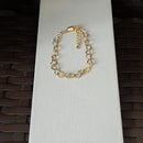 Pulseira Cibele com elos de corações folheado a ouro.