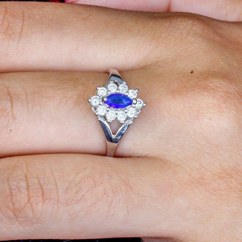 Anel Thalia com zirconias safira e brancas folheado a rodio