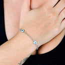 Pulseira Otavia com olho grego folheada a rodio