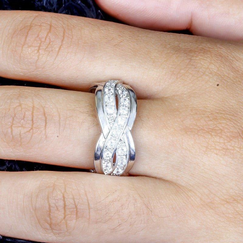 Anel Largo Donna com zirconias brancas folheado a rodio