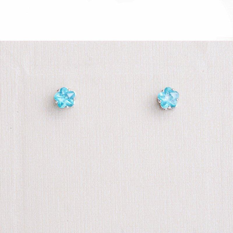 Brinco Flora flor zirconia azul folheado a rodio