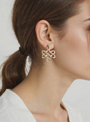 Brinco infinito folheado a ouro