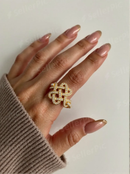 Anel Infinito com pedras de zirconias folheado a ouro